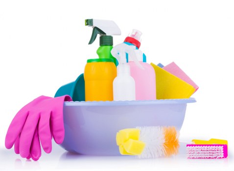 Local cleaner working on residential windows in Wembley