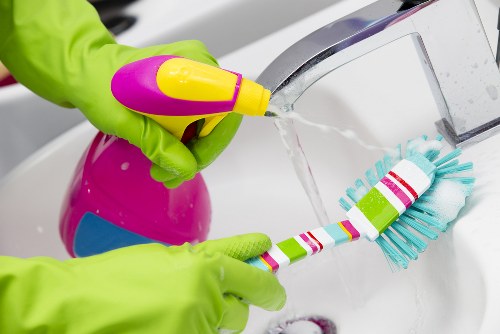 Office cleaning team maintaining a Wembley workplace reception area
