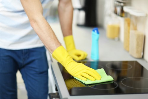 Local Wembley cleaner preparing a freshly cleaned bathroom